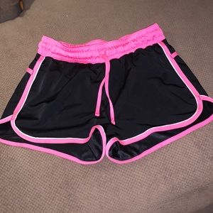 Black and neon pink shorts